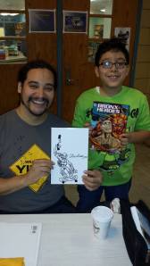 Comic book pro, Ray Felix and budding young artist.